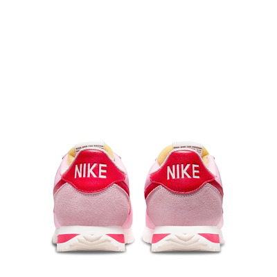 pink and red nike cortez