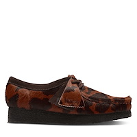 Mocassins Wallabee à imprimé vache brun et noir pour femmes